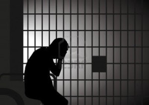9061605-vector-illustration-of-a-man-in-jail